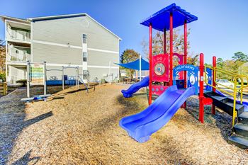 the playground at the whispering winds apartments in pearland, tx
